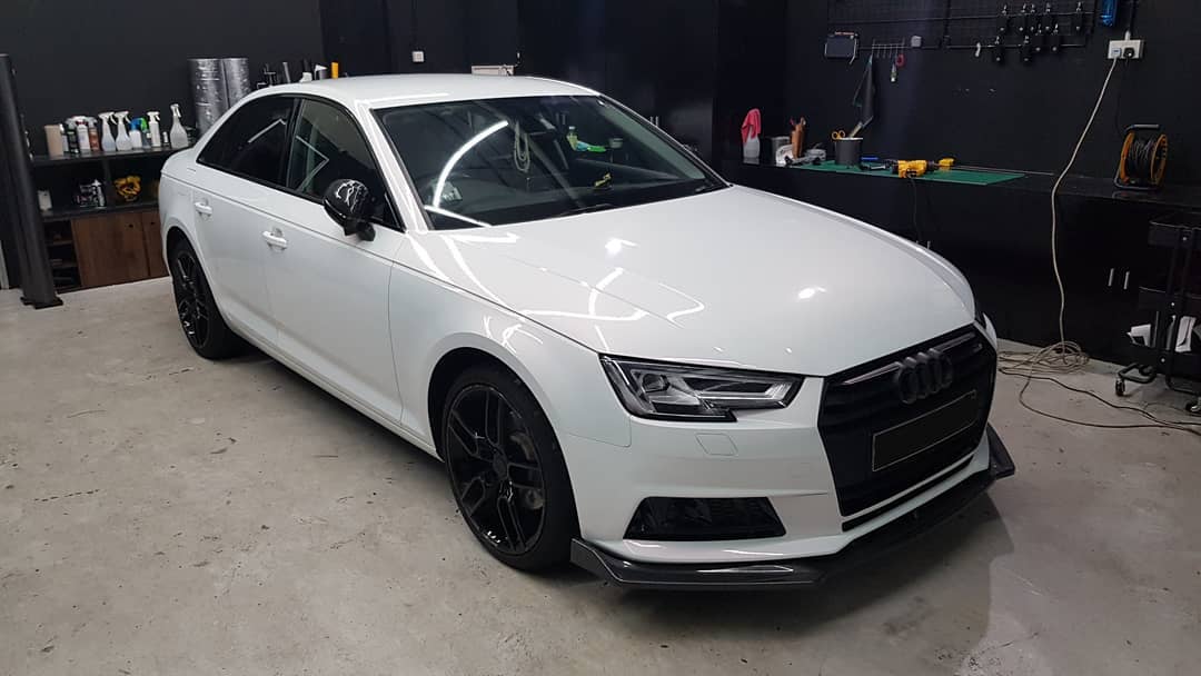 Pearl white red iridescent on a clean played Audi A4.