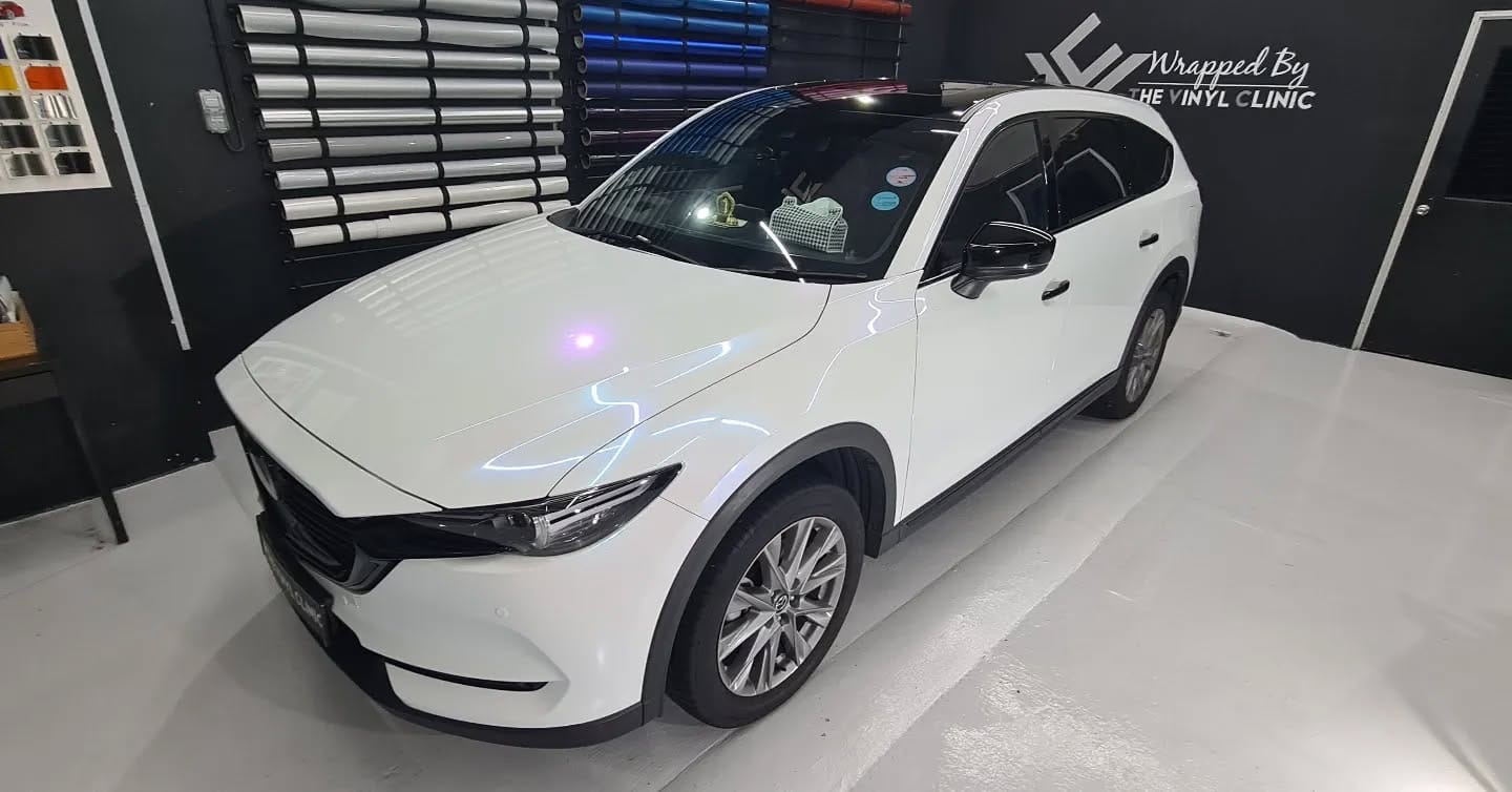 Mazda CX-7 in Diamond pearl iridescent blue with full chr...