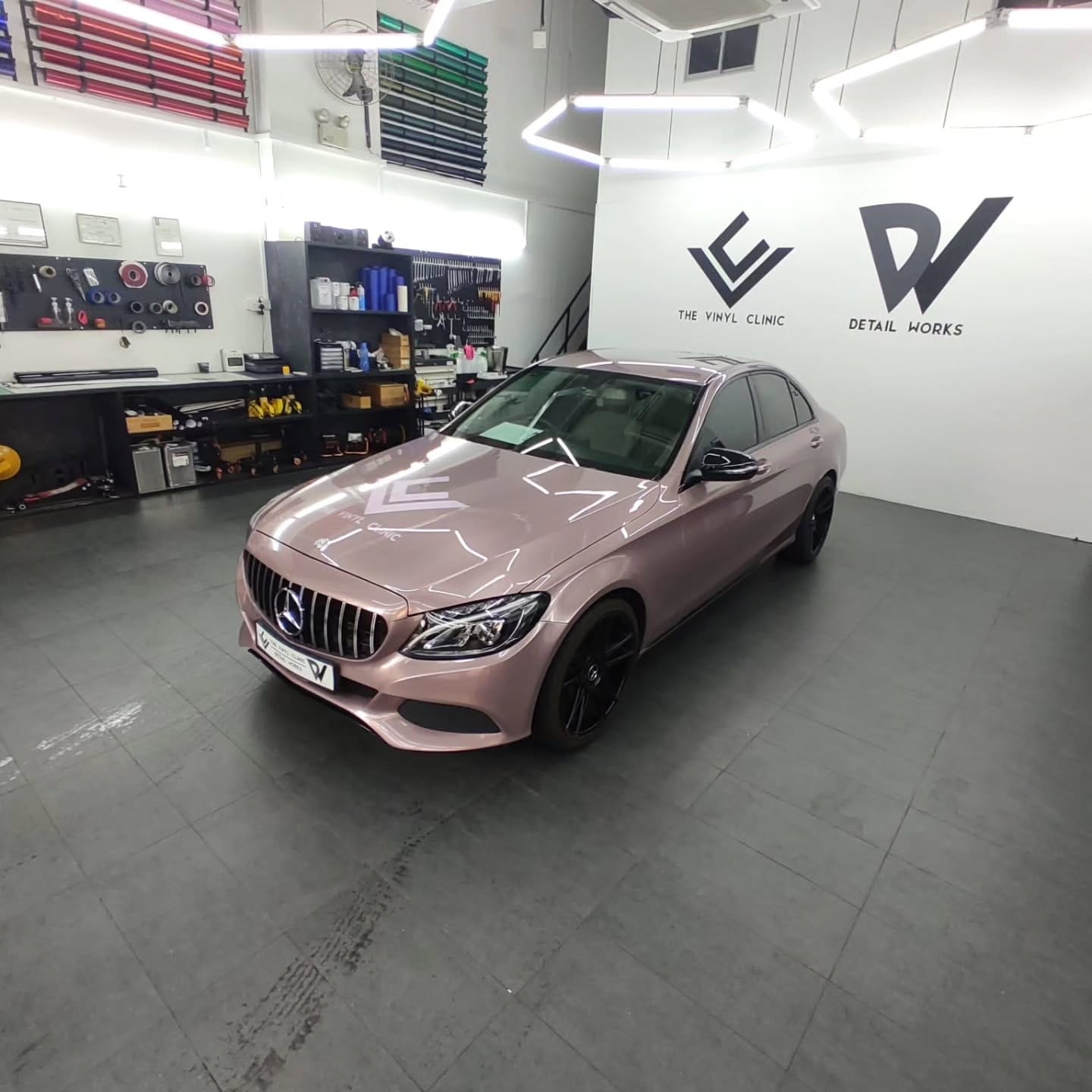 Mercedes C180 in Berry Pink.
