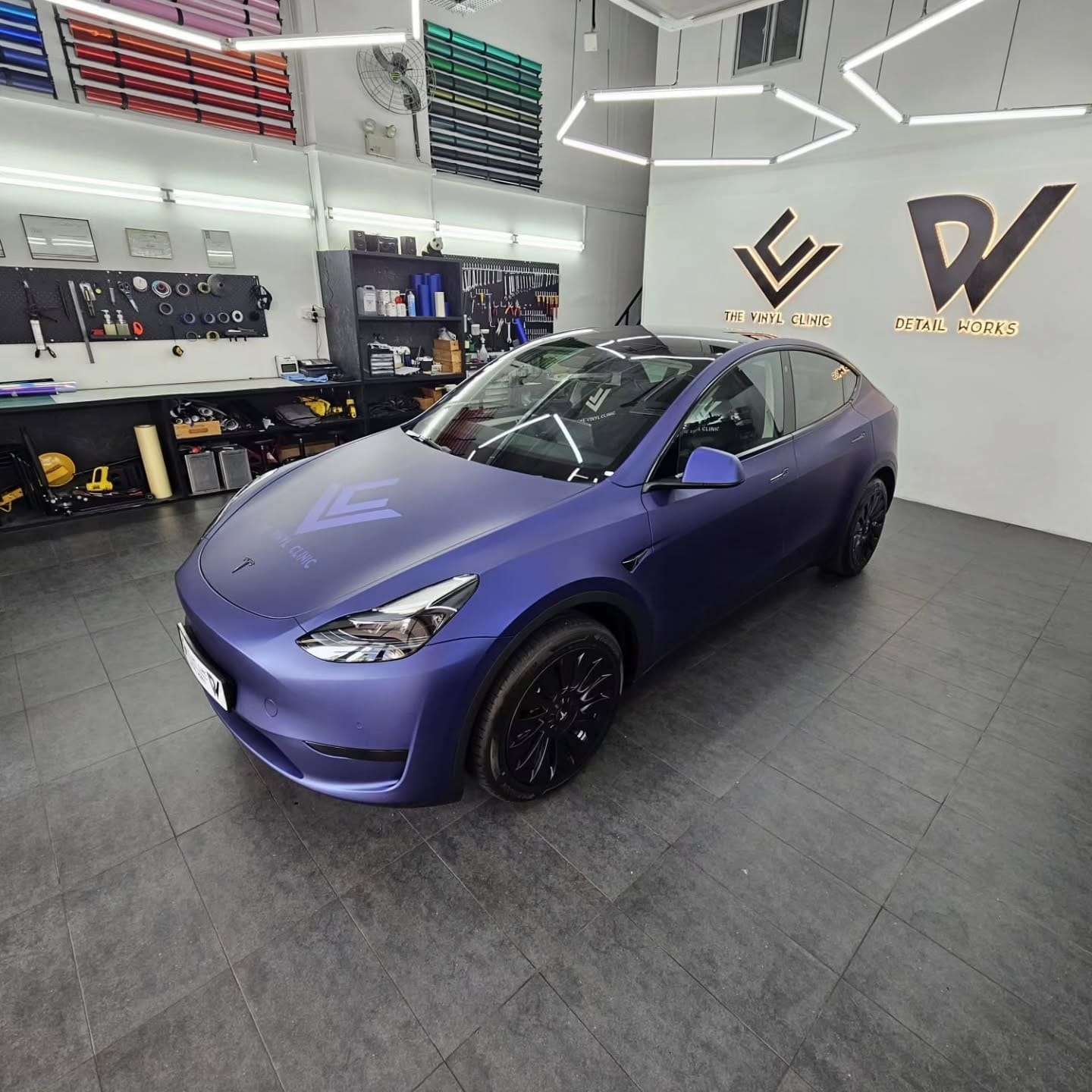 Avery Dennison metallic night blue with VKOOL solar film....