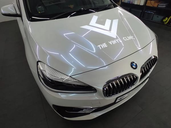 BMW 216GT in Pearl White Iridescent Blue.