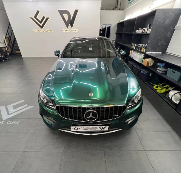 Royal Green E300 with custom yellow brake calipers. Fireball Aegis coating protection by @detailworkssg.