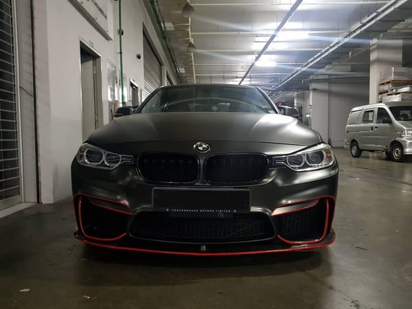 Satin black chrome with red accents.