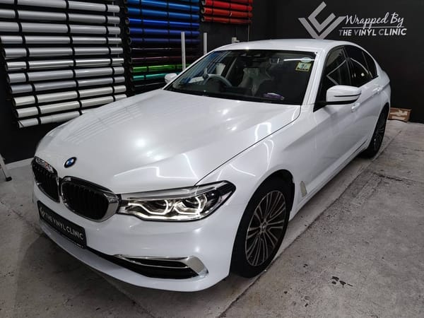 Inozetek gloss pearl white with Hexis silver chrome.