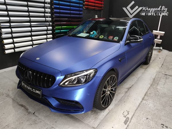 Matte Metallic Slated Blue with chrome trims covered in g...