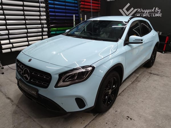 Super gloss Glacier blue with black out chrome trims.