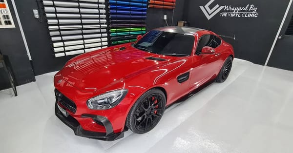 AMG gloss red with 5D carbon roof.