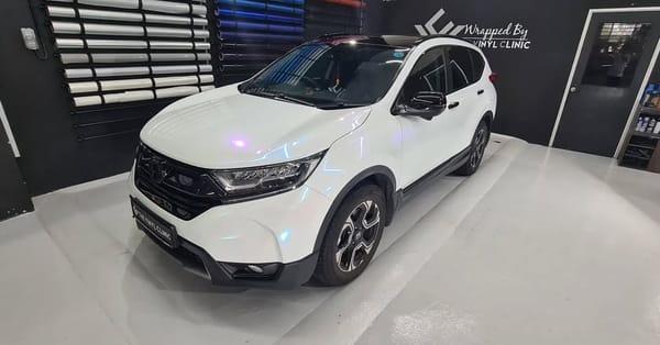 Honda CRV in pearl diamond iridescent blue.