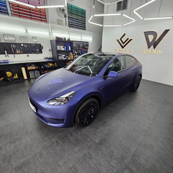 Avery Dennison metallic night blue with VKOOL solar film....