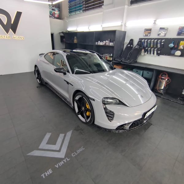 Porsche Taycan on self healing Tempest Gray.