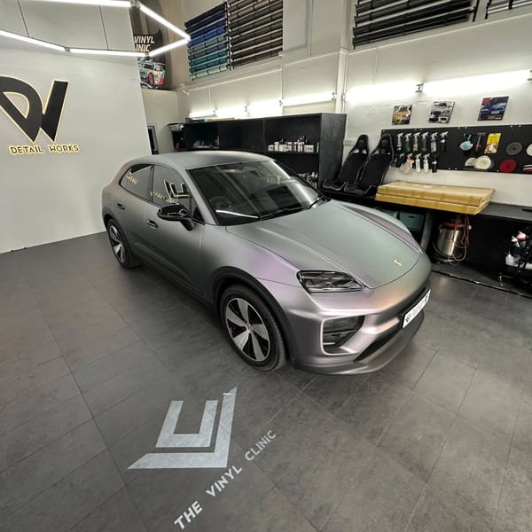 Brand Macan EV in Capri Grey Purple.